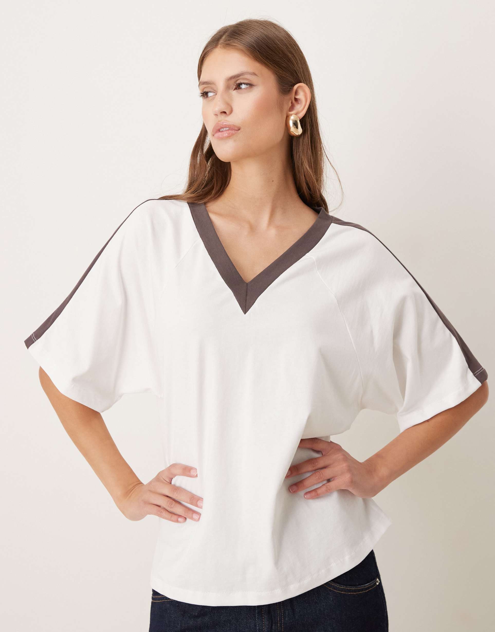 asos design v neck top in cream with chocolate piping