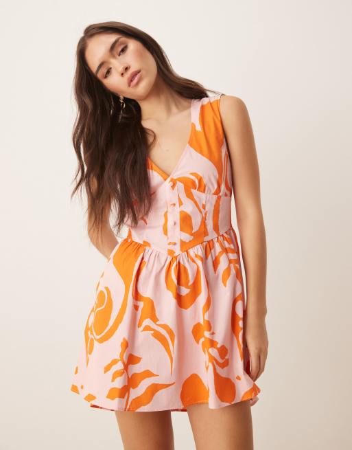 ASOS DESIGN v neck waisted button down mini dress in pink abstract print