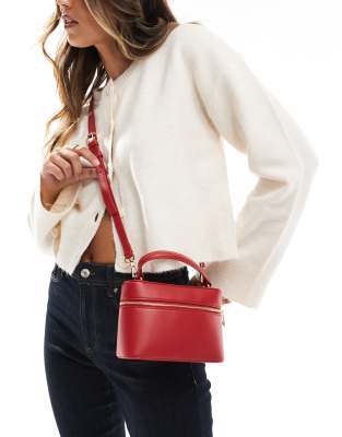 vanity cross body bag in red with detachable crossbody strap in red