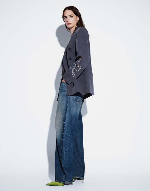 ASOS DESIGN vaquero holgado con lazo en azul medio oscuro, 2 de 9