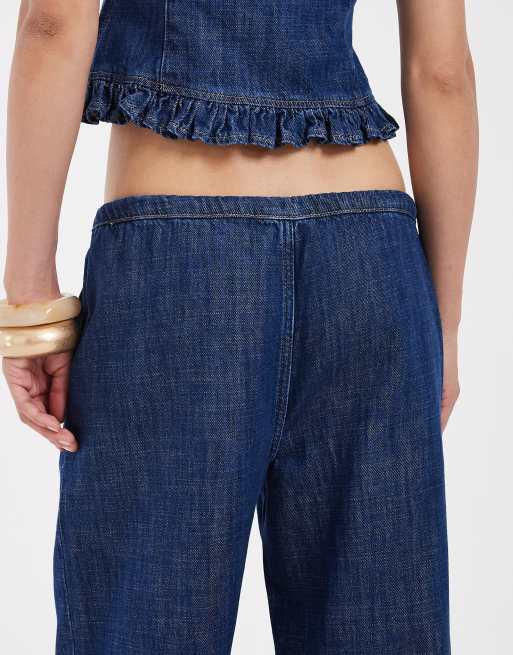 ASOS DESIGN - Vaqueros azul medio sin cierres con volantes (parte de un conjunto), 4 de 5