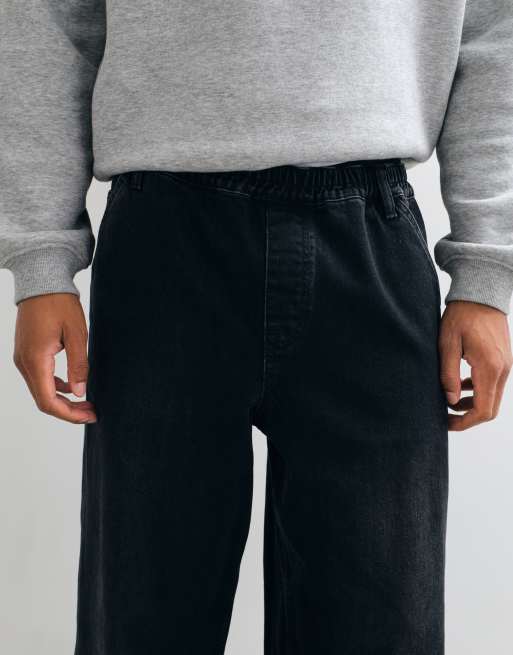 ASOS DESIGN vaqueros baggy en negro lavado con cintura elástica, 4 de 5