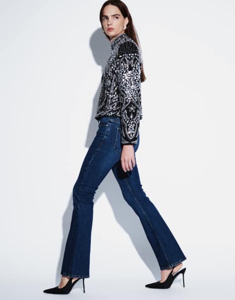 ASOS DESIGN - Vaqueros bootcut acampanados en azul medio oscuro - view 1