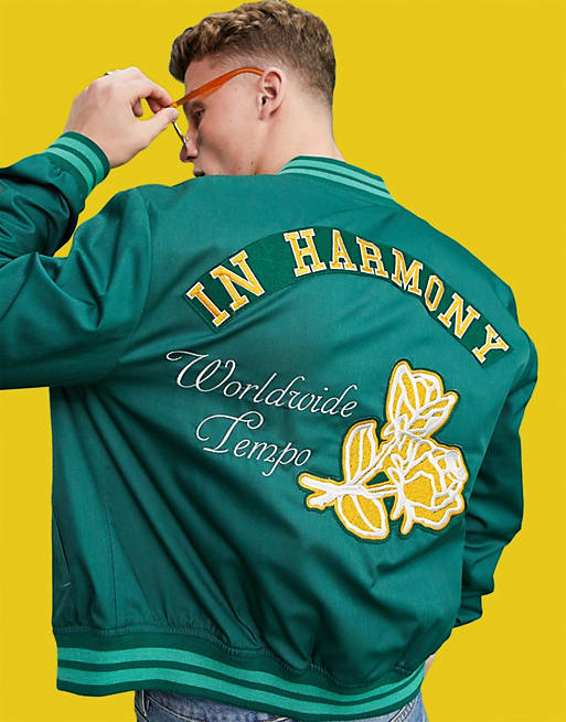 ASOS DESIGN varsity bomber jacket in green with embroidery badging