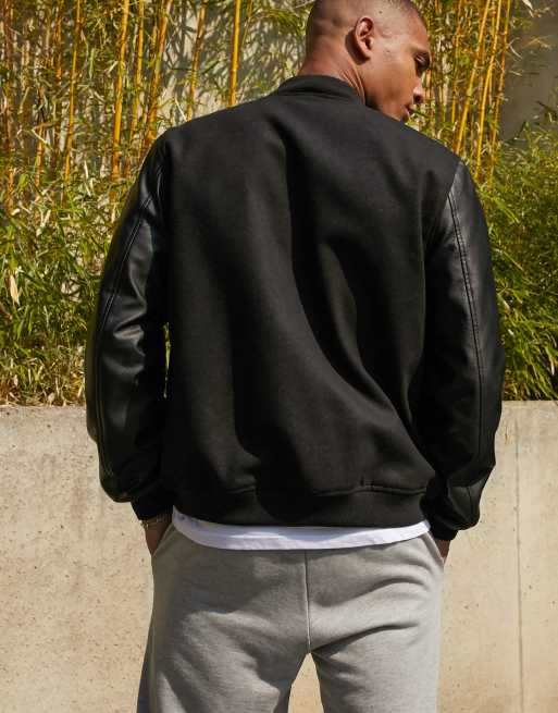 ASOS DESIGN leather varsity coach jacket with embroidery in black