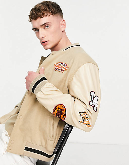 ASOS DESIGN varsity jacket with embroidered faux leather sleeves