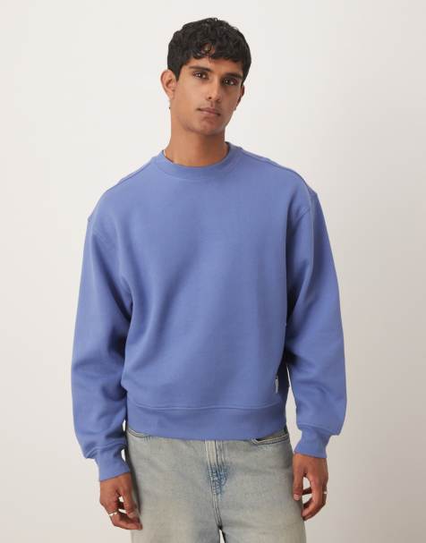 ASOS DESIGN - Vasket blå oversized sweatshirt med vævet mærkedetalje - view 1
