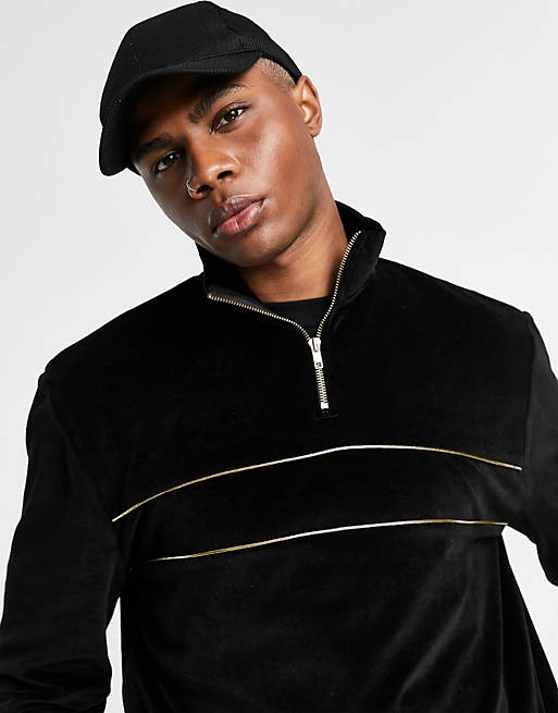 ASOS DESIGN velour sweatshirt with half zip in black with gold details