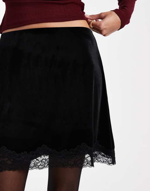 ASOS DESIGN velvet mini skirt with lace hem in black ASOS