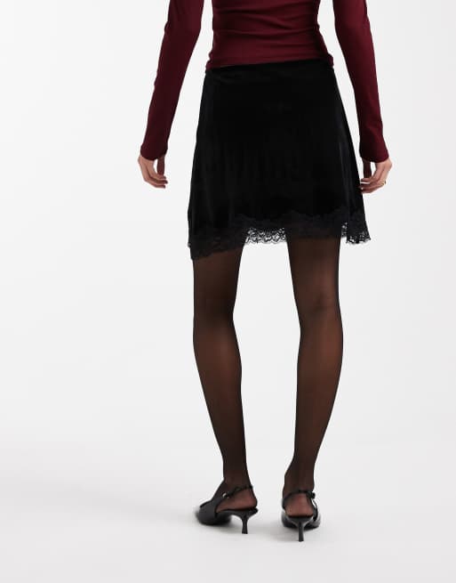 ASOS DESIGN velvet mini skirt with lace hem in black ASOS