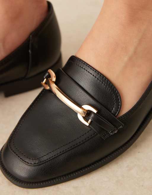 Black loafers store with silver buckle