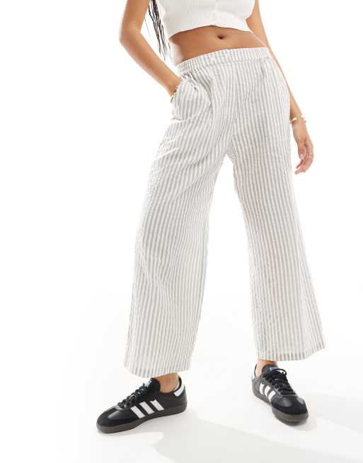 ASOS DESIGN – Verkürzte Schlupfhose mit Bundlasche und orangefarbenem Streifenmuster, 2 von 5