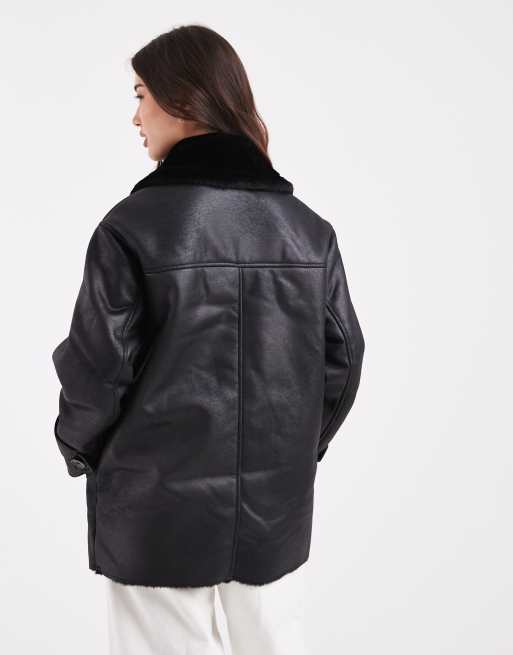 ASOS DESIGN – Verstärkte Oversize-Pilotenjacke in Schwarz mit Teddyfell, 3 von 4