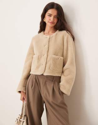 ASOS DESIGN - Verstärkte Teddyfell-Jacke in Cremeweiß ohne Kragen