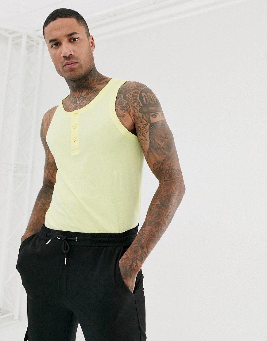 ASOS DESIGN vest with button neck in yellow