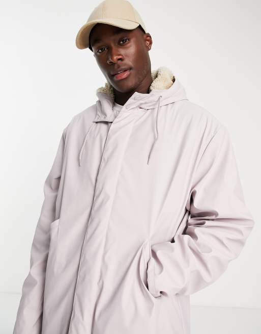 ASOS DESIGN Veste en caoutchouc imperm able avec doublure en imitation peau de mouton Rose