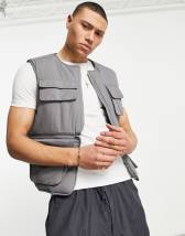 ASOS 4505 - Gilet de course sans manches réfléchissant avec poches