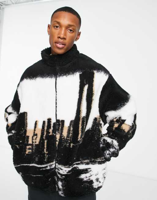 ASOS DESIGN - Veste oversize imitation peau de mouton à fermeture éclair avec imprimé urbain - Noir