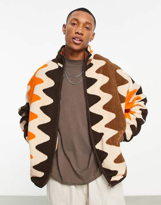 ASOS DESIGN - Veste oversize zippée en imitation peau de mouton avec imprimé vagues sur l'ensemble