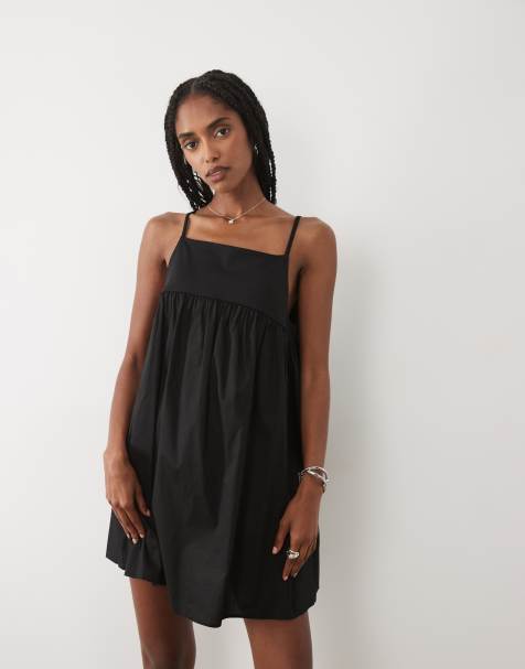ASOS DESIGN - Vestido corto negro híbrido acampanado con cuello halter - view 1