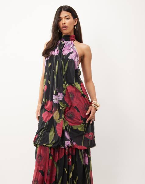 ASOS DESIGN - Vestido largo halter de gasa elástica con bajo asimétrico y estampado floral negro - view 1