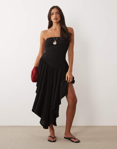 ASOS DESIGN - Vestido midi negro texturizado con bajo asimétrico - view 1