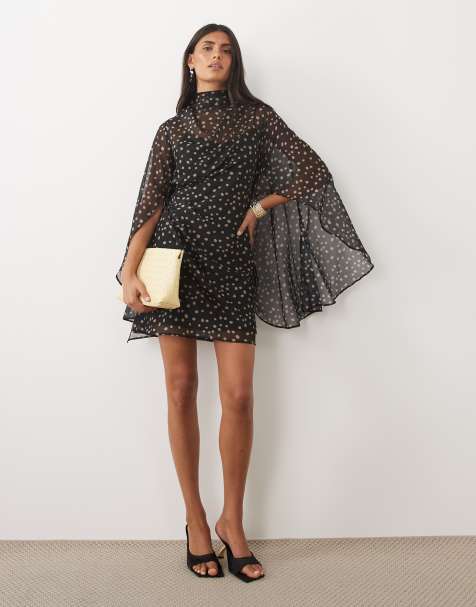 ASOS DESIGN - vestido mini con cuello alto, drapeado delantero y mangas capa extragrandes en estampado de lunares monocromo - view 1