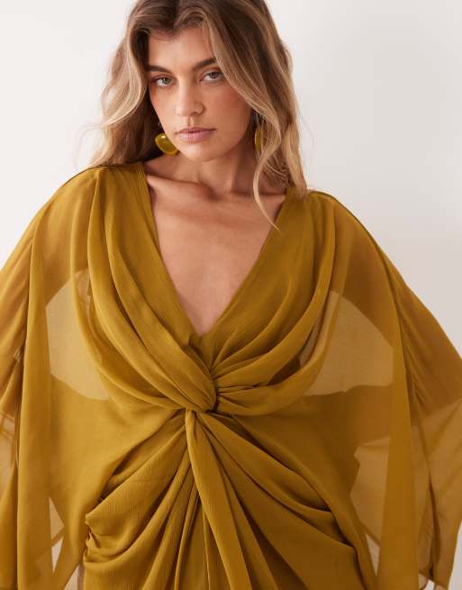 ASOS DESIGN vestido mini de manga larga con nudo delantero y espalda descubierta en ocre, 2 de 4