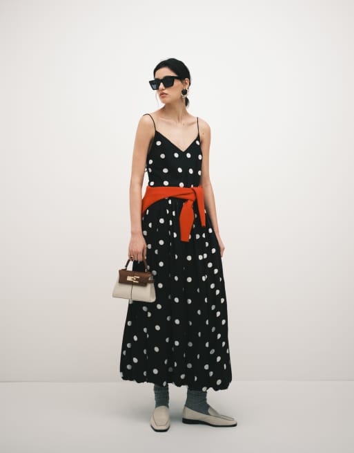 ASOS DESIGN - Vestito a trapezio midi con gonna a palloncino e taglio sbieco a pois monocromatici