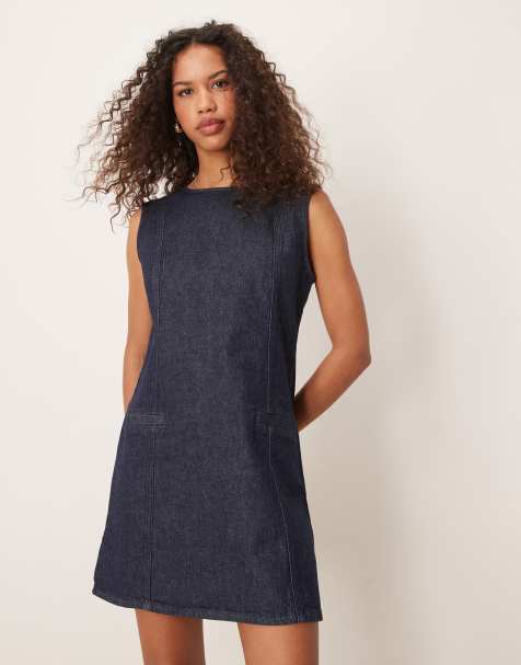 ASOS DESIGN - Vestito corto in denim color indaco dalle linee pulite con tasche a filetto - view 1