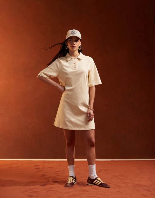 ASOS DESIGN - Vestito corto stile polo piqué color latticello con colletto e abbottonatura