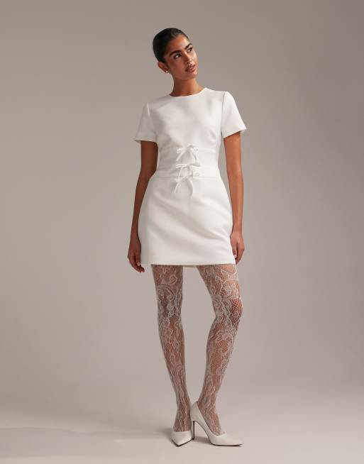 ASOS DESIGN - Vestito corto strutturato in raso color avorio con fiocchi
