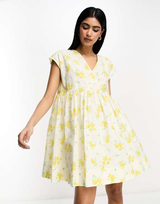ASOS DESIGN - Vestito grembiule corto in cotone a fiori con scollo a V