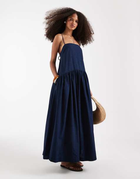 ASOS DESIGN - Vestito grembiule midi in denim lavaggio inchiostro con tasche laterali - view 1