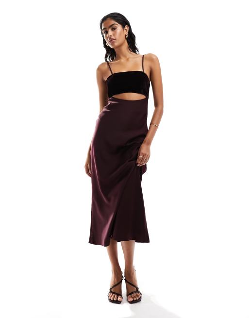 ASOS DESIGN - Vestito in raso con gonna al polpaccio, bustino in velluto e cut-out color bordeaux
