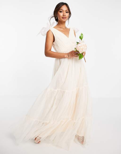 ASOS DESIGN - Vestito lungo color oro in tulle con fiocco