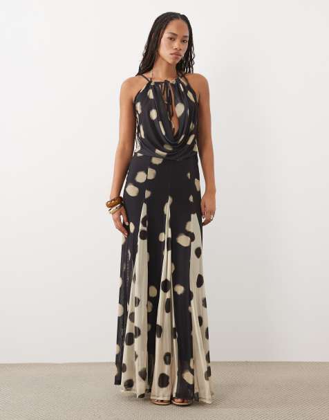ASOS DESIGN - Vestito lungo con scollo ad anello profondo nero con stampa a pois e godet a contrasto - view 1