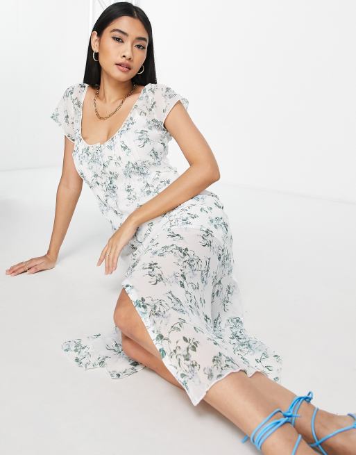 ASOS DESIGN - Vestito lungo stile anni '90 con pinces, bottoni e stampa a fiorellini su base bianca 