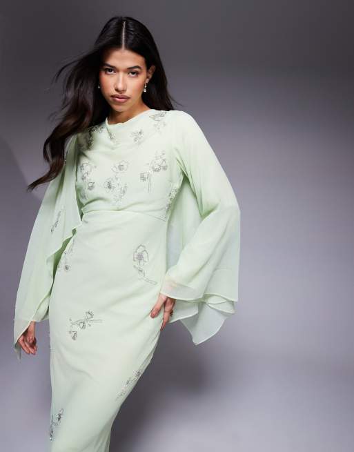 ASOS DESIGN - Vestito lungo taglio sbieco verde salvia con fiori ricamati, dettaglio a mantella e scollo ad anello