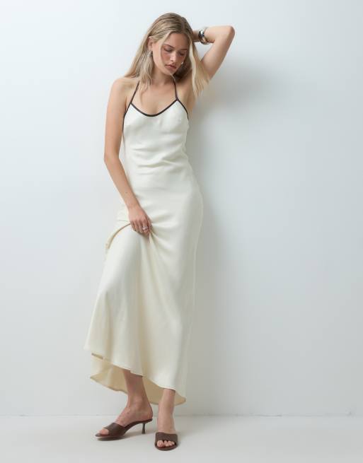 ASOS DESIGN vestito maxi svasato in raso con canotta allacciata al collo color avorio, 1 di 4