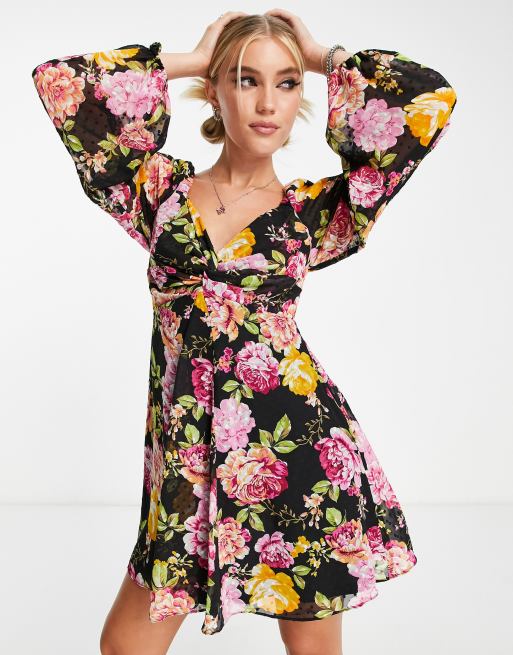 Vestito skater corto babydoll con gonna godet e schiena scoperta a fiori vistosi Asos Donna Abbigliamento Vestiti Vestiti scollati 