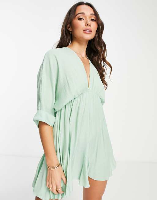 ASOS DESIGN - Vestito skater corto con scollo a V e apertura a goccia sulla schiena verde mela