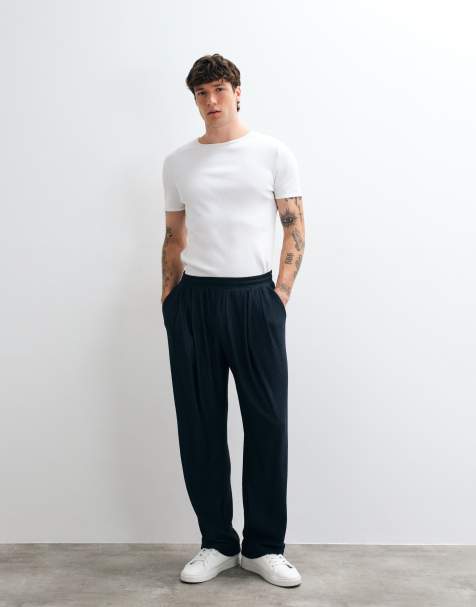 ASOS DESIGN vida ben texturerade plisserade joggers med dubbla veck i marinblått - view 1