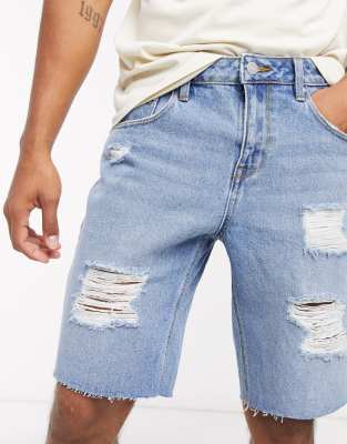 ASOS DESIGN vintage slim denim shorts in mid wash blue with rips | ASOS