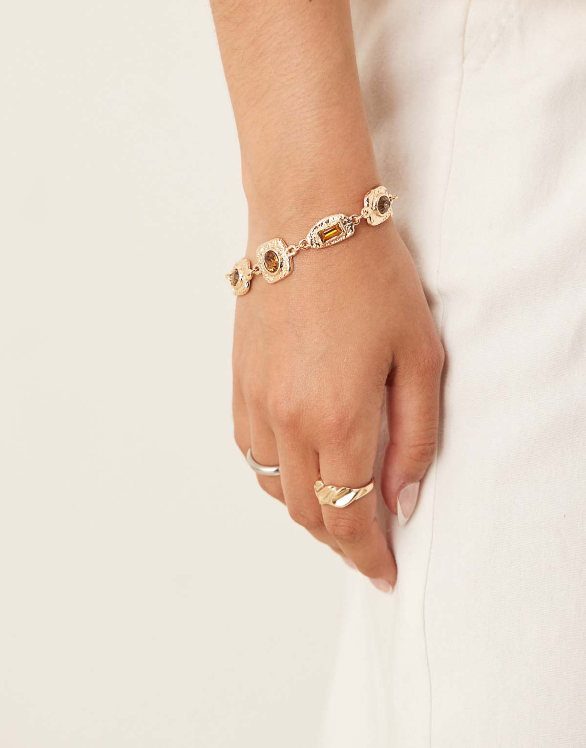 ASOS DESIGN vintage style bracelet with resin stones in gold tone
