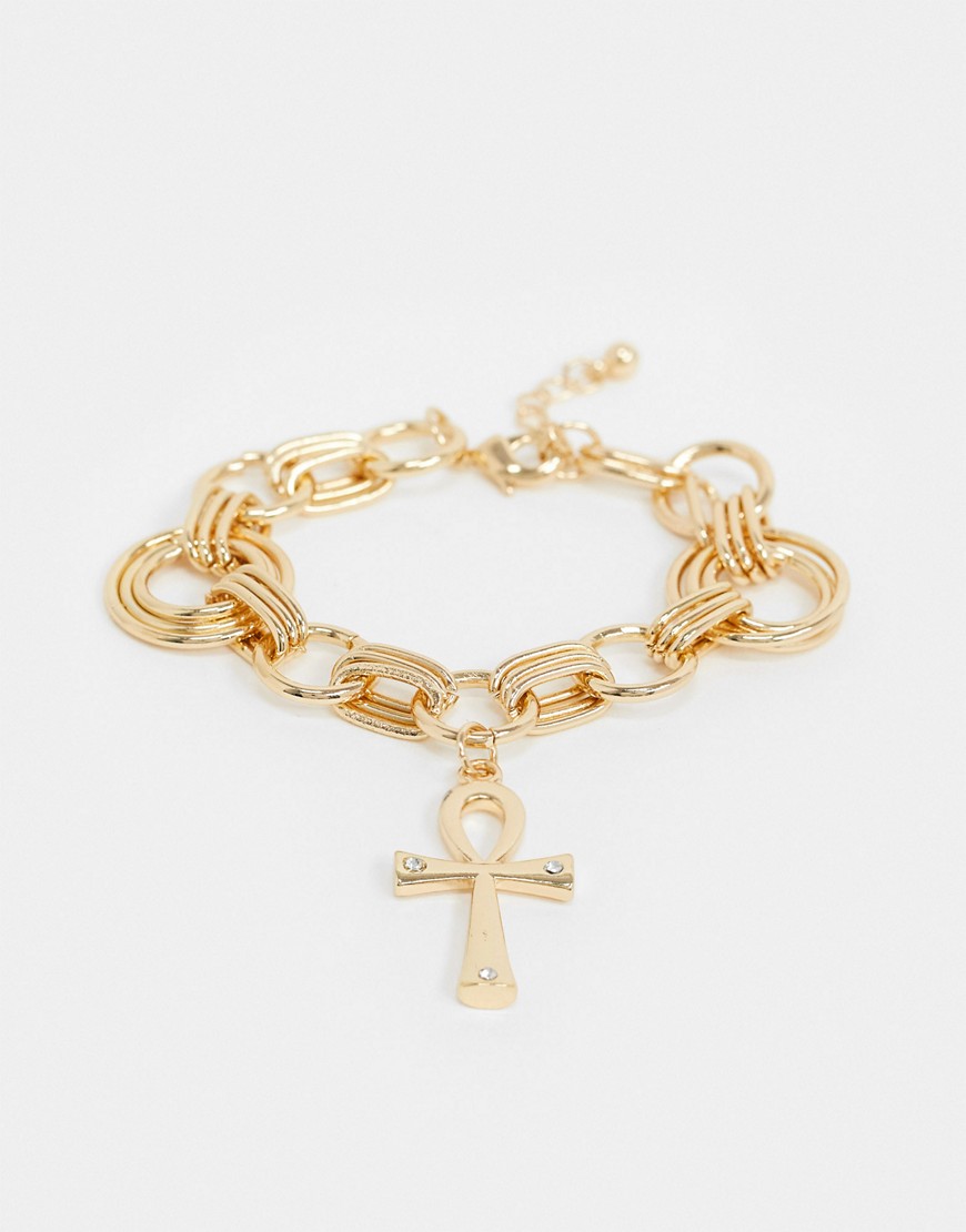 ASOS DESIGN vintage style chain bracelet with diamante studded cross in gold tone