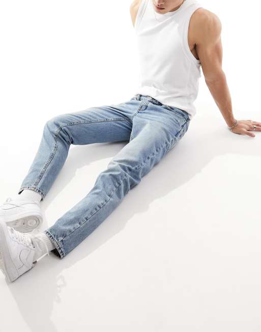 ASOS DESIGN relaxed tapered jeans in vintage mid wash