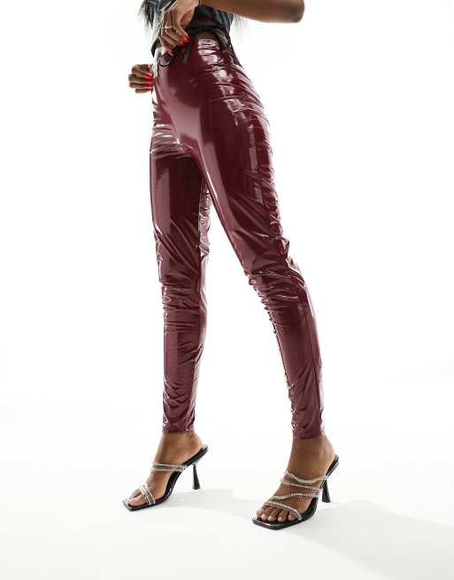 ASOS DESIGN vinyl leggings in oxblood