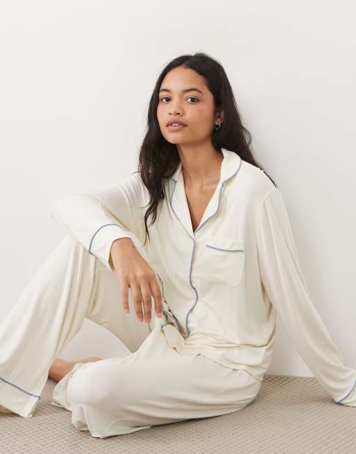 ASOS DESIGN Viscose super soft long sleeve shirt and trouser pyjama set in ivory with blue contrast trim, 3 of 4