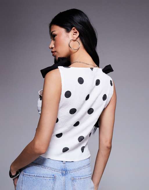 ASOS DESIGN – Vit, prickig, texturerad topp med rosettprydda axlar, 4 av 4